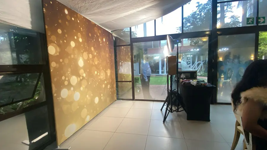Backdrop Photo Booth at a modern indoor venue