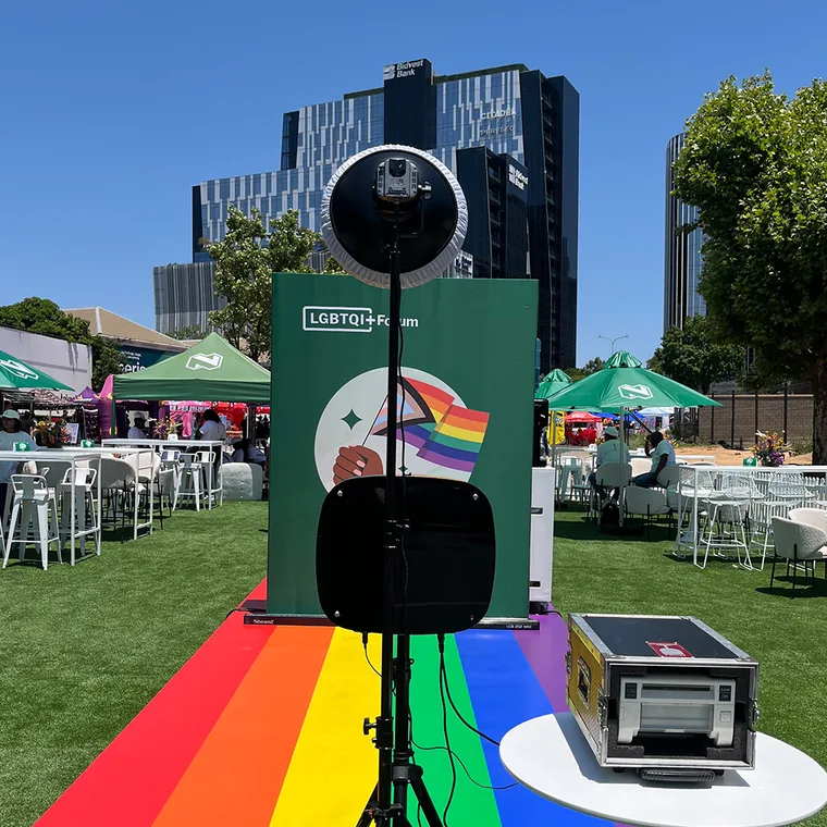 Solo Selfie Cube with beauty-dish light at an outdoor corporate event